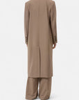 Blazer coat and wide-leg pants by CLOSED, back view against a plain background, modern tailored style.