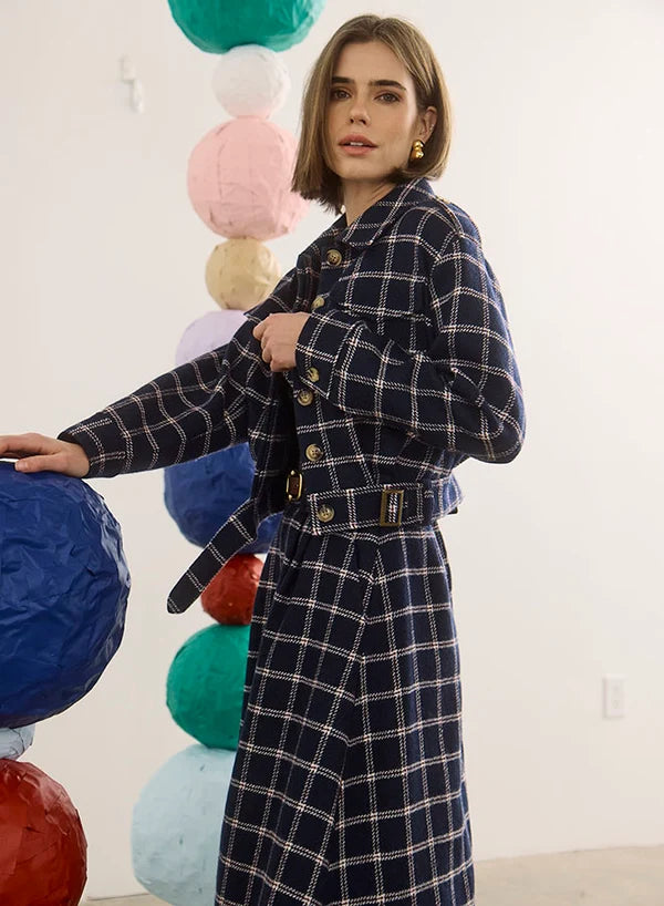 Dorrington Jacket by Hunter Bell NYC in playful setting with oversized colorful paper spheres indoors.