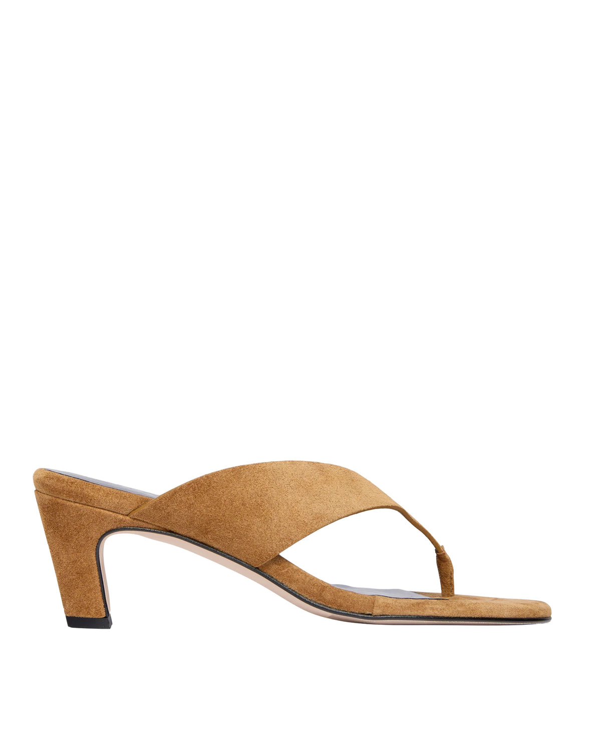 The KAT by Freda Salvador is a tan suede heeled thong sandal, inspired by '90s style, with an open toe and moderate block heel.