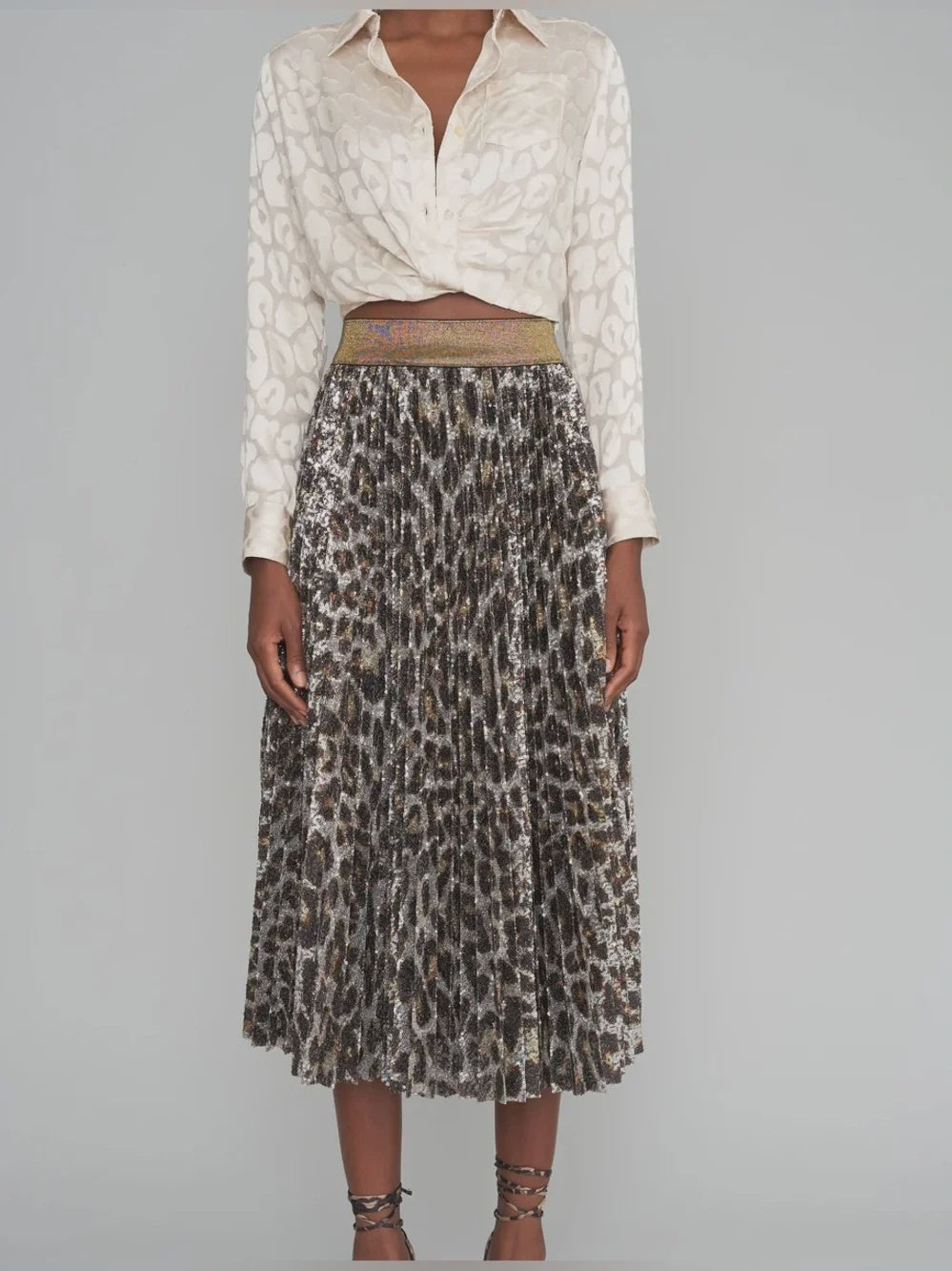 Le Superbe Mrs Mason pleated skirt in metallic leopard print with a gold-toned elastic waistband.