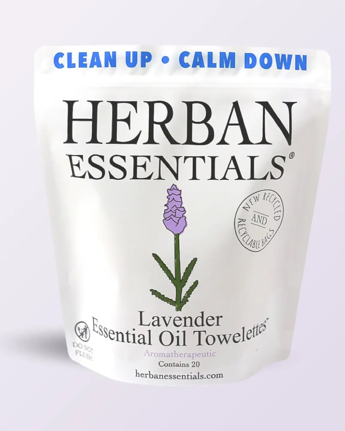A resealable pouch labeled "Faire Lavender Towelettes - 20 Individual Essential Oil Wipes" features a lavender flower, purple and black text, and phrases "Clean Up · Calm Down" and "New Recycled & Recyclable Bags," highlighting calming wipes.