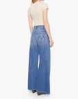 Mother’s Lil Lemon Twist Skimp petite wide leg jeans shown from the back, styled with a beige top.