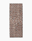 The Faire Leopard Yoga Towel features a rectangular design with an orange, brown, and black leopard print on a light background and a thin black border. Made from ultra-absorbent material, it combines style and comfort for your yoga sessions.