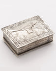 The J Alexander Rustic Silver 88-6 Silver Box w/ Longhorn features a rectangular rustic silver design with a raised longhorn head on the lid and decorative edging, making it perfect for Southwestern home decor. Shown against a plain white background.