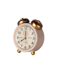 Pink and gold vintage-style Maileg alarm clock showing 12:00, by Maileg, on a white background.