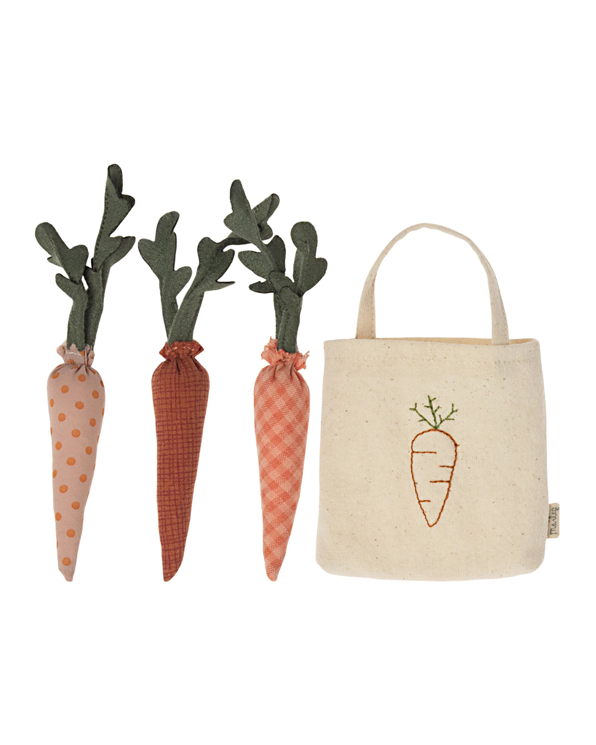 The Maileg Carrots in Bag set features three patterned fabric carrots with green tops and a small beige tote bag embroidered with a carrot, perfect for imaginative play.