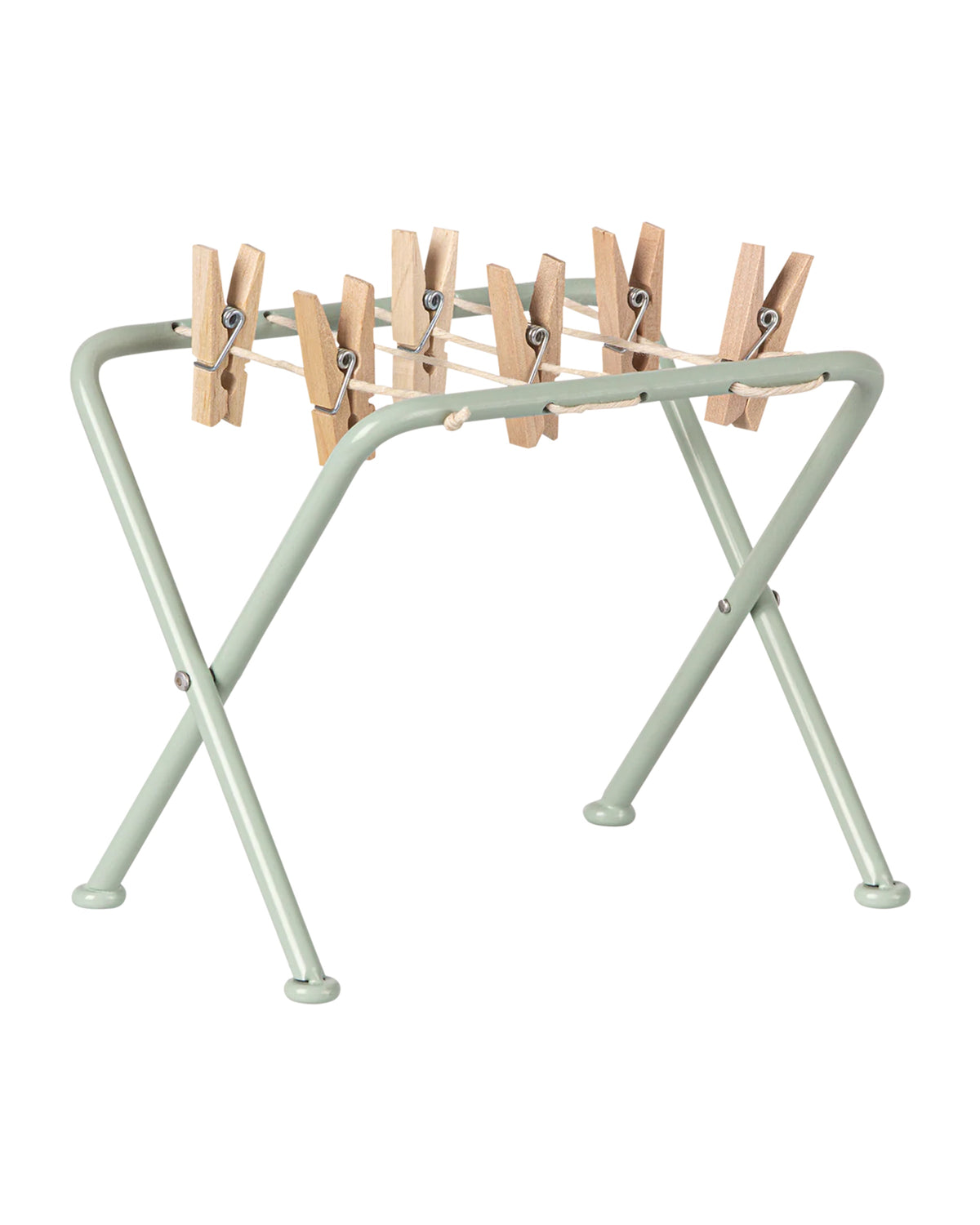 The Maileg Drying rack w. pegs, Miniature is a small, foldable drying rack with a light green metal frame and wooden pegs—ideal for dollhouse laundry scenes.