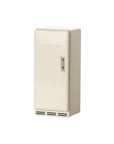 The Maileg Fridge by Maileg is a small, cream-colored, old-fashioned fridge with an embossed logo and single handle, ideal for the Maileg Mouse hole Farmhouse and shown against a white background.