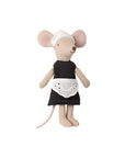 The Maileg Maid Mouse / Big Sister by Maileg stands upright on a plain white background, dressed in a black dress, a white eyelet apron, and a white bonnet.