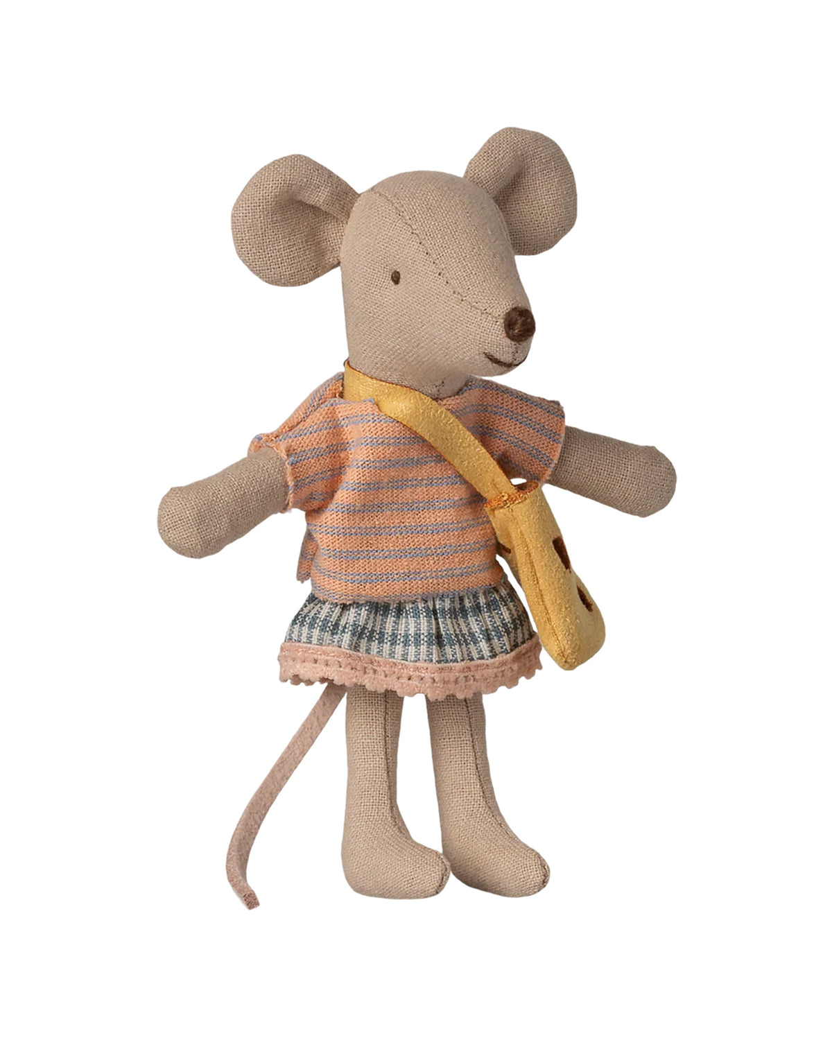 The Maileg Little Sister Mouse W/ Bag by Maileg stands upright against a white background, dressed in a striped shirt, plaid skirt, and carrying a yellow cheese bag.