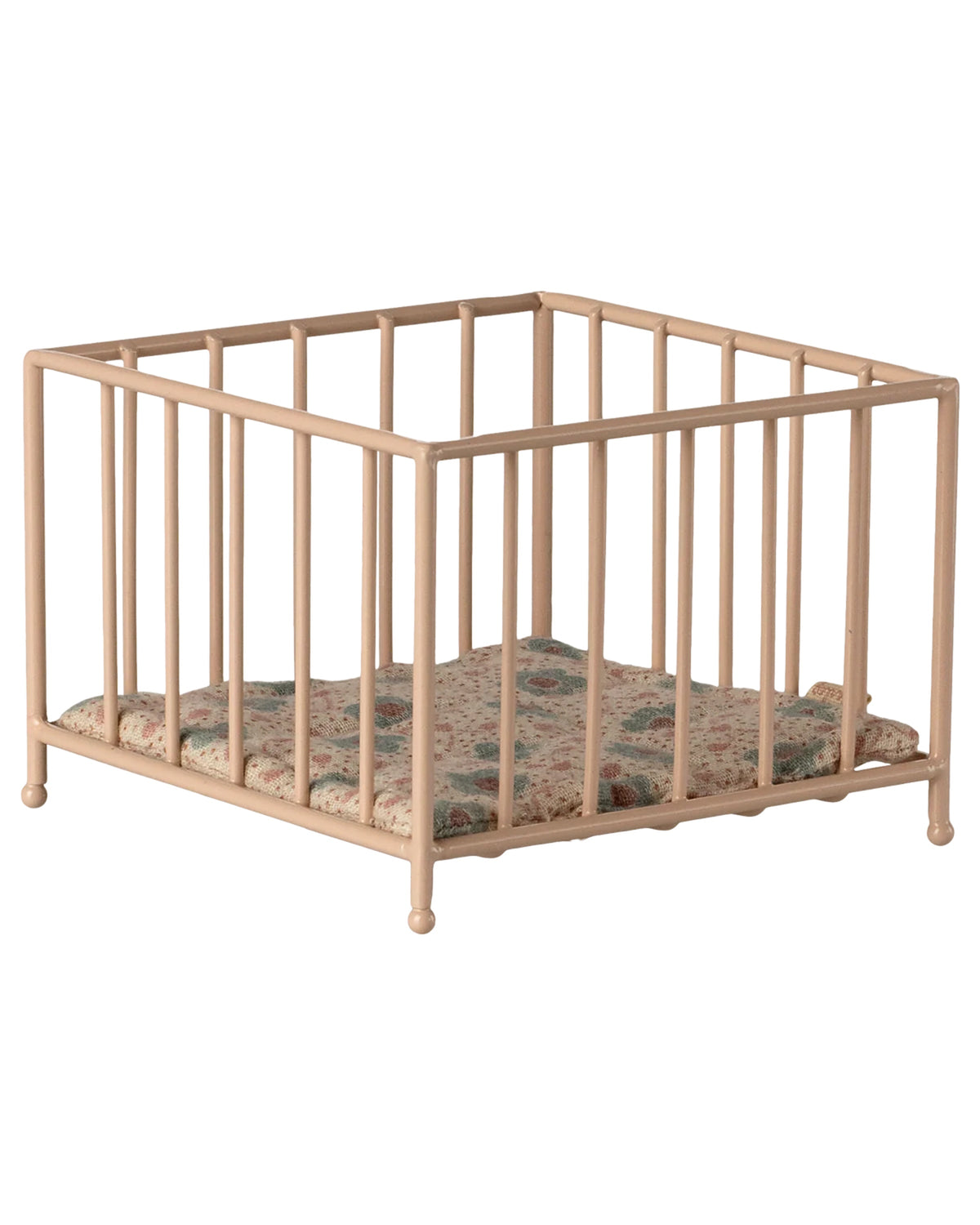 The Maileg Playpen, My - Rose is a small beige playpen with vertical bars and a floral-patterned cushioned mat inside, displayed on a white background.