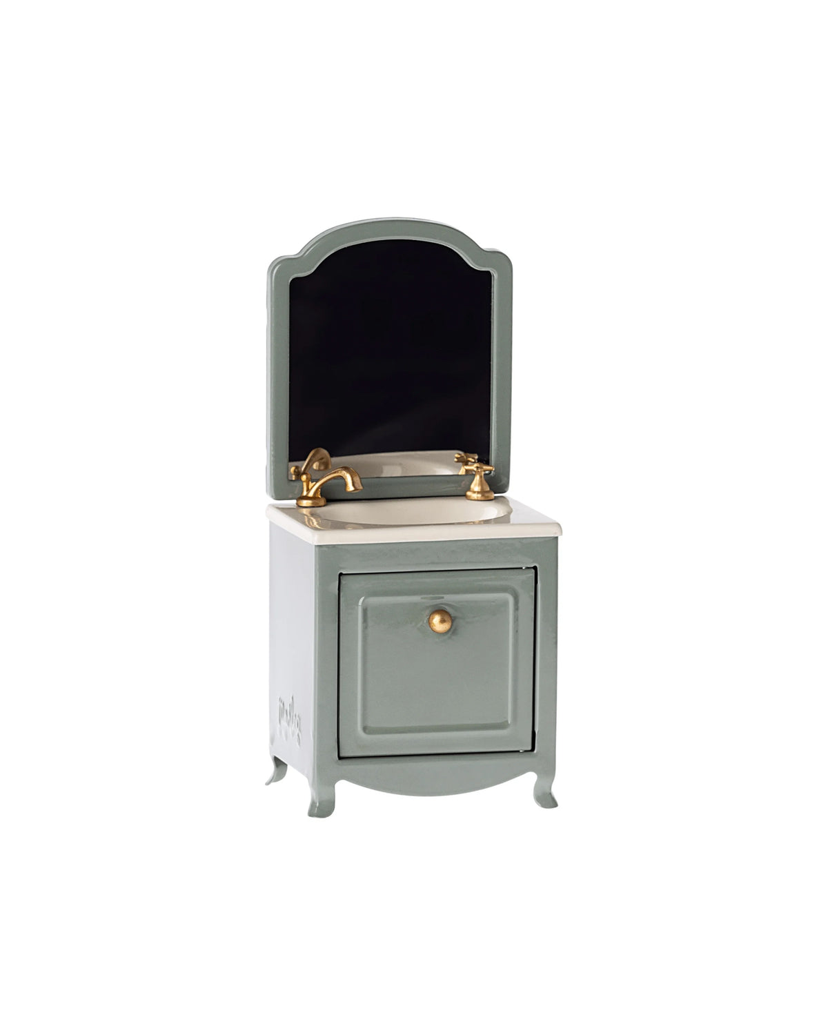 The Maileg Sink Dresser is a small, vintage-style miniature vanity featuring a rectangular mirror, brass faucet, white countertop, and green farmhouse cabinet with a gold knob—perfect for bathroom sink displays.