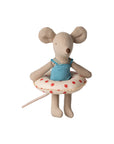 The Maileg Little Sister Beach Mouse by Maileg features large ears, a long tail, and comes dressed in a blue swimsuit with a round white float with red polka dots—perfect for poolside fun.