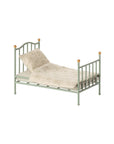 Maileg vintage single bed with bedding, beige pillow, and blanket, classic style for kids rooms.