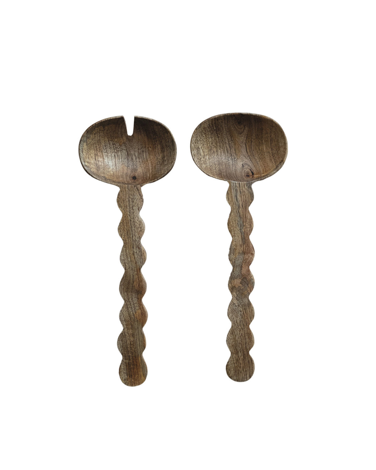 Bloomingville's Mango Salad Servers feature two natural carved mango wood pieces—one spoon and one fork style—each with scalloped handles and showcasing the wood's beautiful grain.