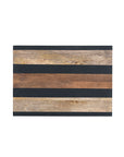 The Bloomingville Mango Wood Serving Board features alternating natural and black horizontal stripes, offering a stylish touch as a cutting board or serving tray.