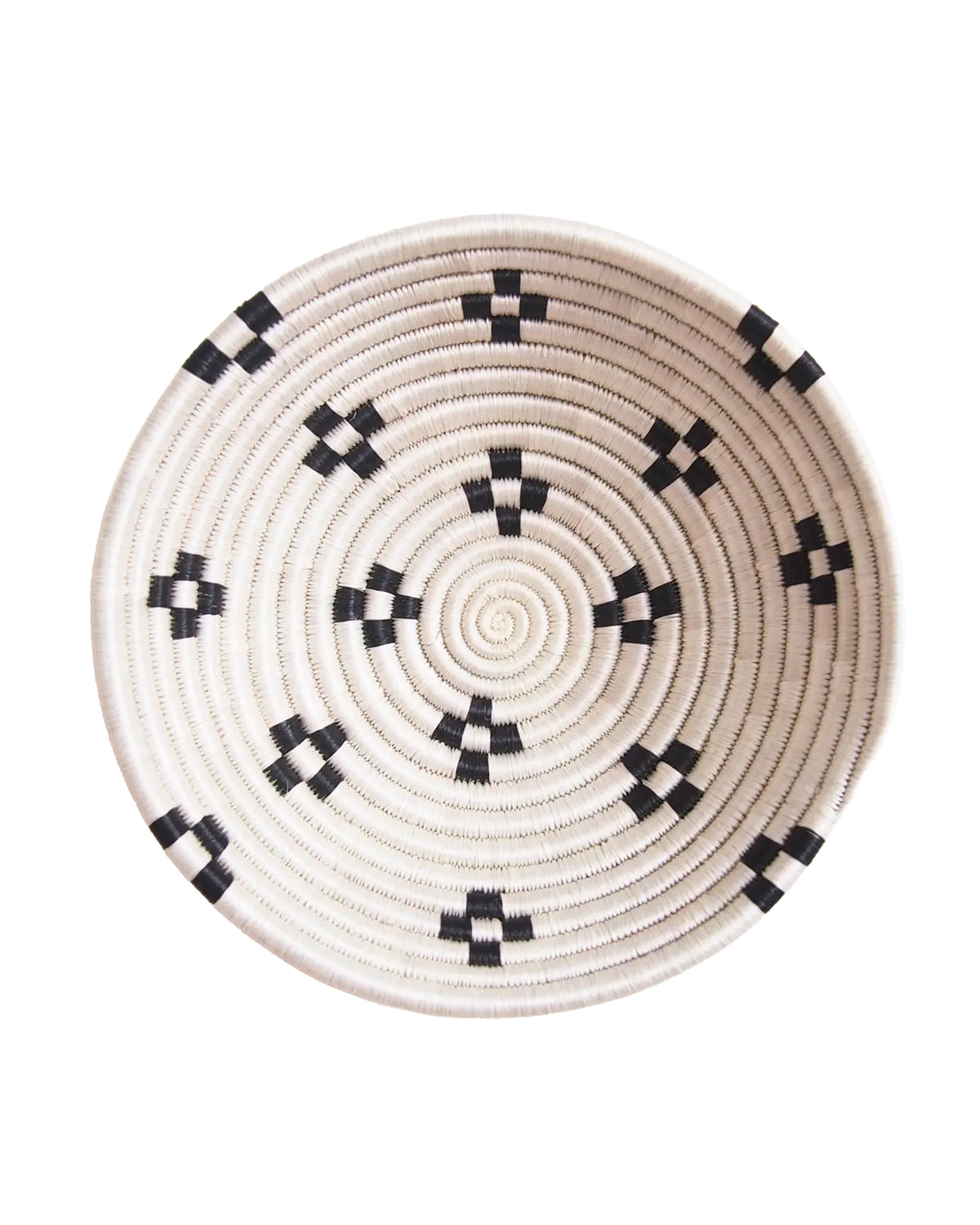 Round sisal bowl by Faire with black geometric spirals, perfect as wall art or unique accent for any room.