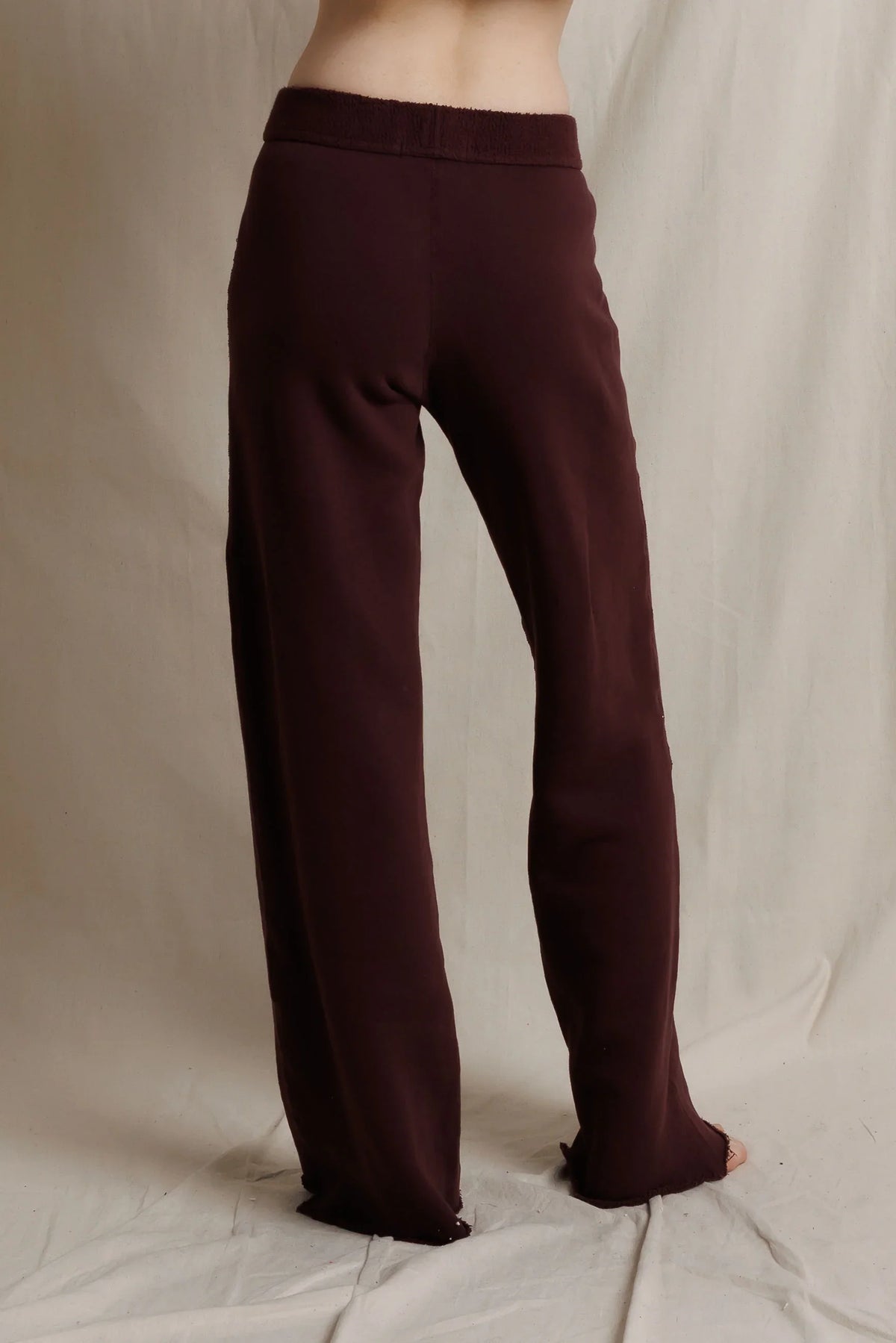 Wide-leg fleece pants by Perfectwhitetee styled casually in a neutral, modern setting.