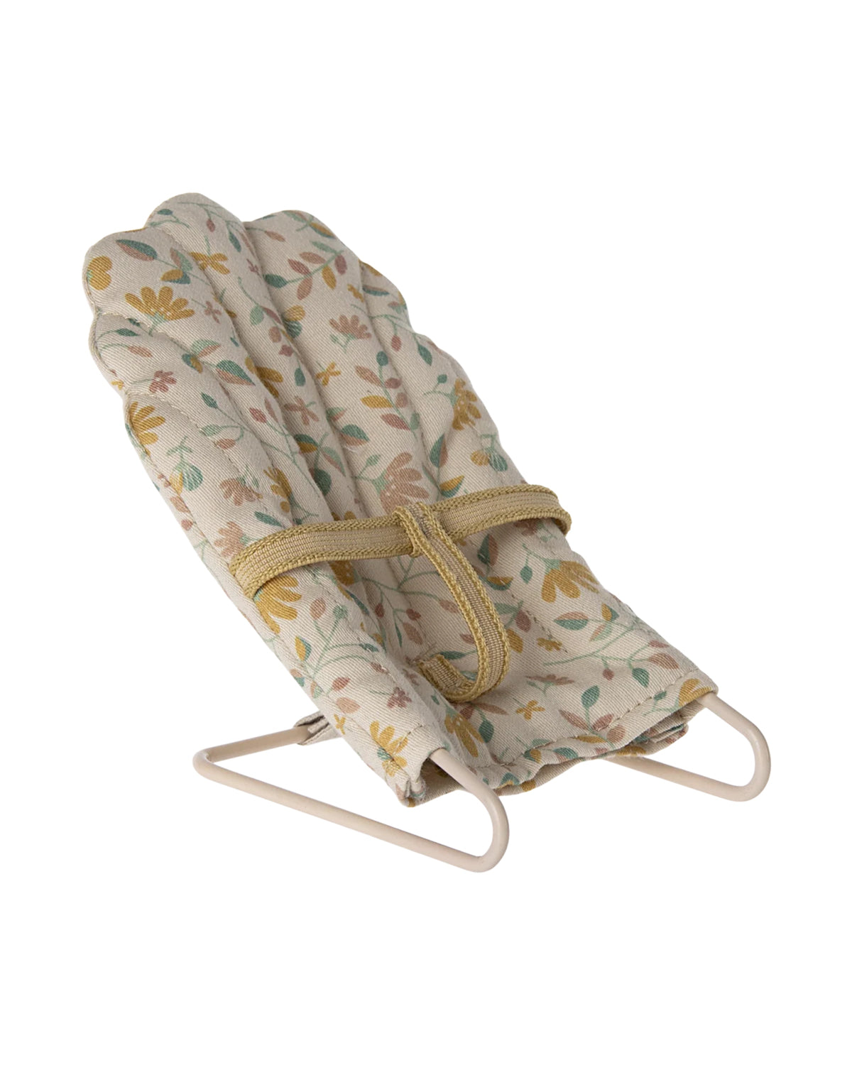Soft beige Maileg micro babysitter seat with safety strap on a white frame, perfect for dollhouse play.