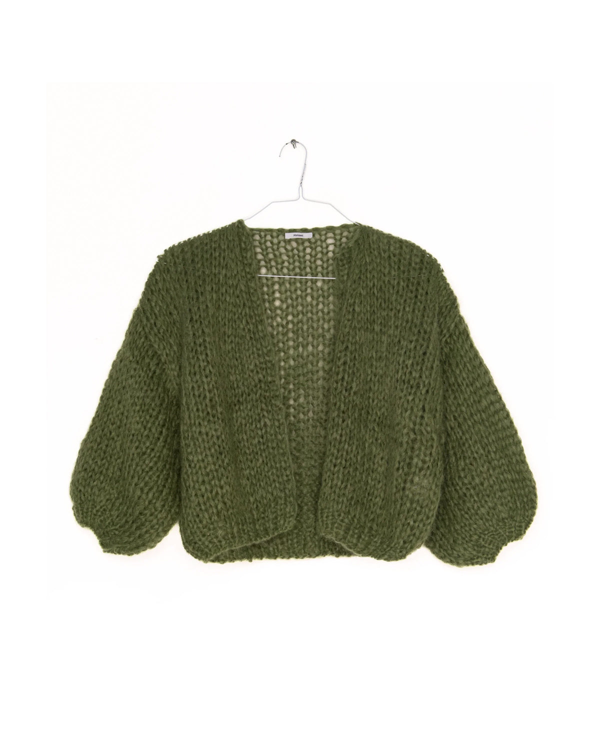 Hand-knitted olive green Maiami Mohair Bomber Cardi with voluminous sleeves on a hanger.