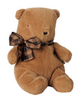 Small brown plush teddy bear with a brown and black checkered ribbon by Maileg.