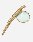 Gold-tone Norine magnifying glass with a long-tailed bird handle by Bungalow Furniture & Accessories.