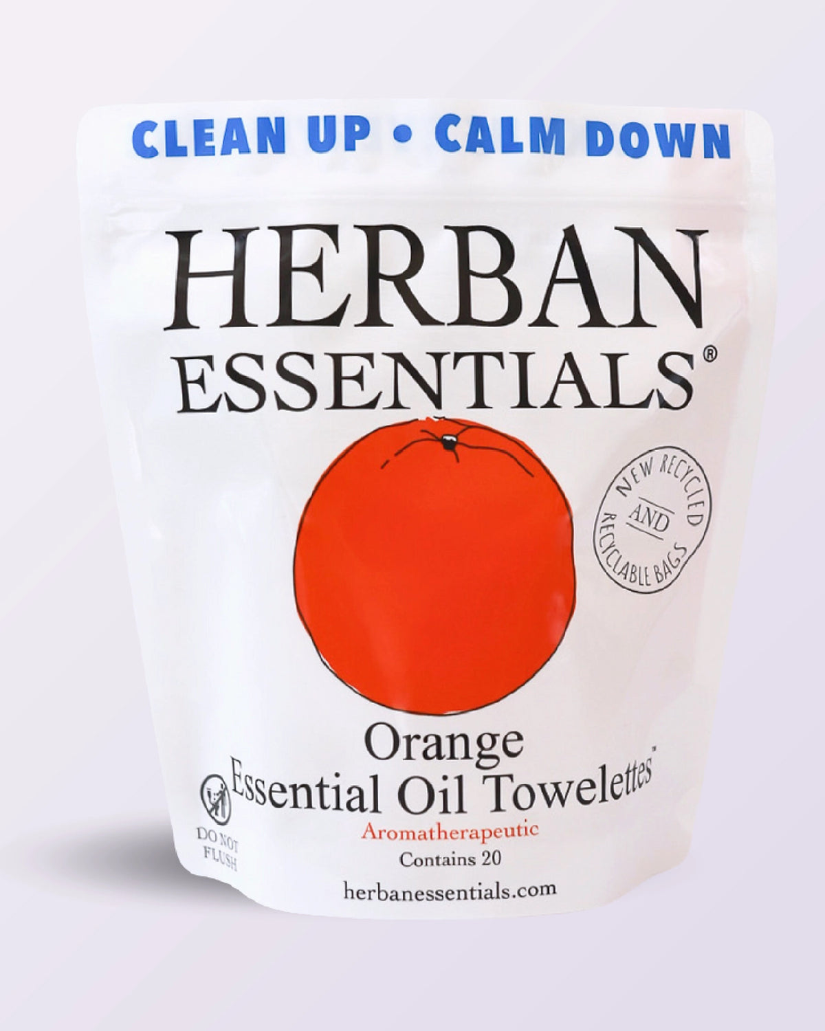 A white pouch labeled "Faire Orange Towelettes - 20 Individual Essential Oil Wipes" with a large orange graphic. Each wipe is infused with orange essential oil and comes individually wrapped. Features “CLEAN UP • CALM DOWN” and “New Recycled & Recyclable Bags.”.