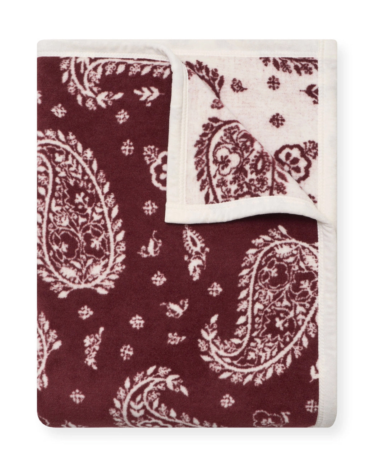 Reversible burgundy throw with white paisley, cream border, by Faire Palmer Paisley for Bungalow Furniture & Accessories.