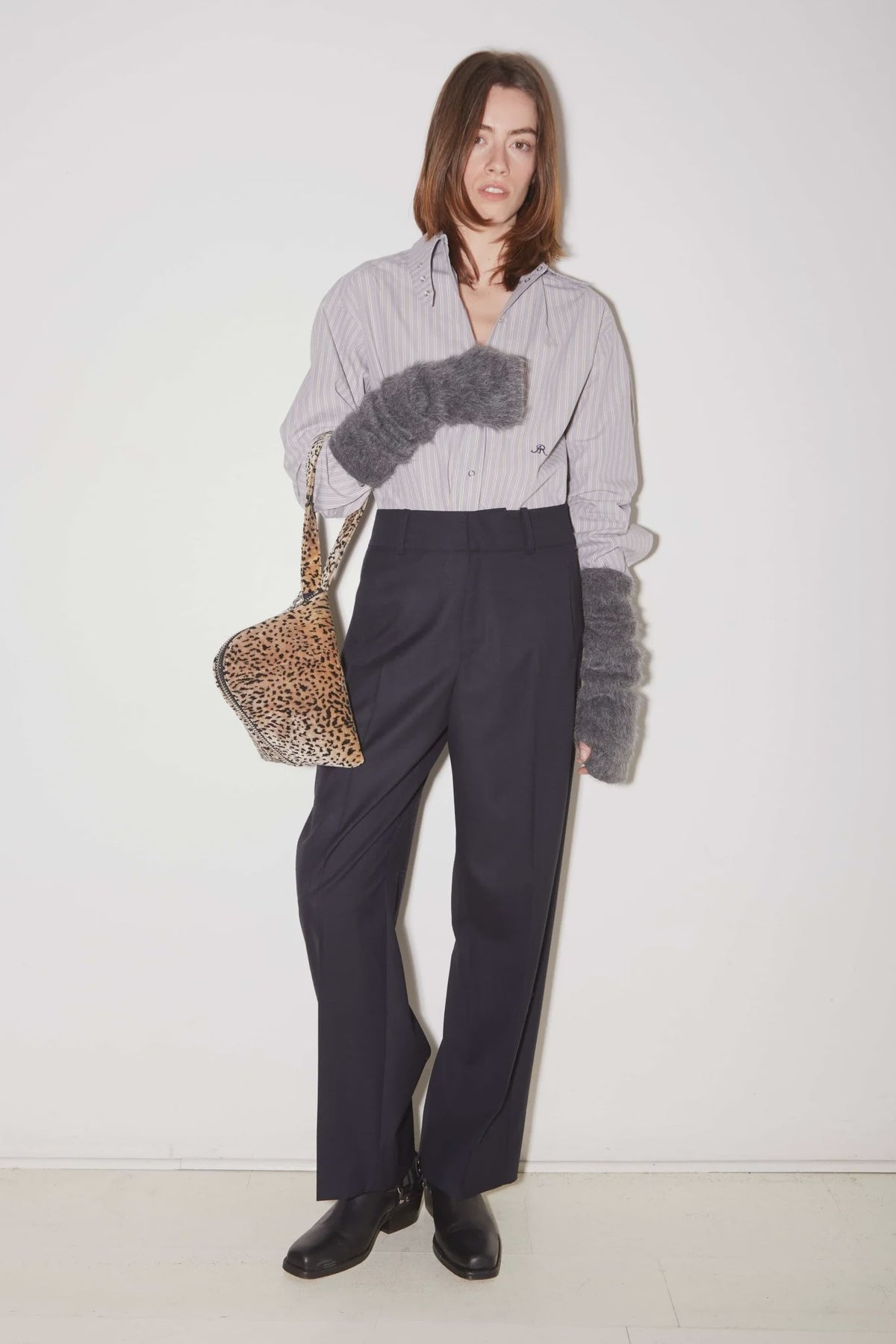 Black Roseanna Pantalon with a tailored mid-rise, wide-leg fit.