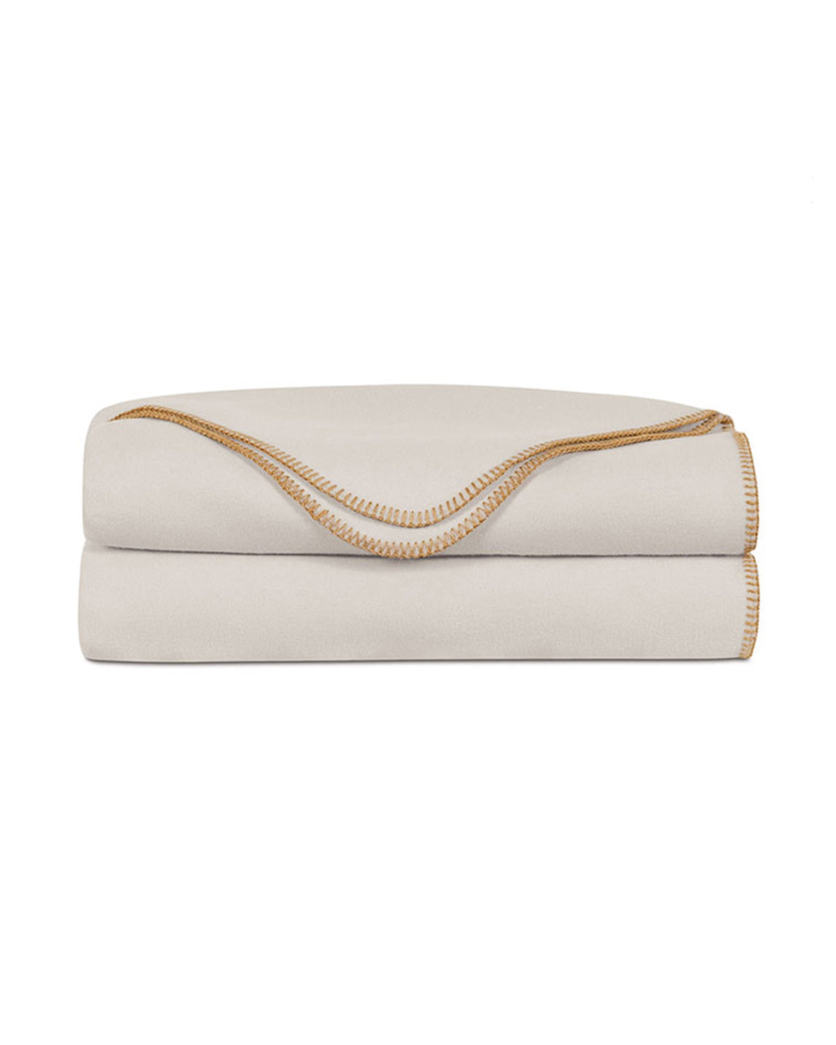 Beige coverlet with brown blanket stitching by Eastern Accents, folded on Carrara Fog surface at Bungalow Furniture.