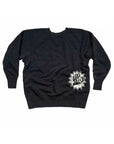 The Made Worn Sex Pistols Shrunken Sweatshirt is a black distressed pullover with a white starburst “Sex Pistols” logo on the lower right front—perfect for "God Save The Queen" fans.
