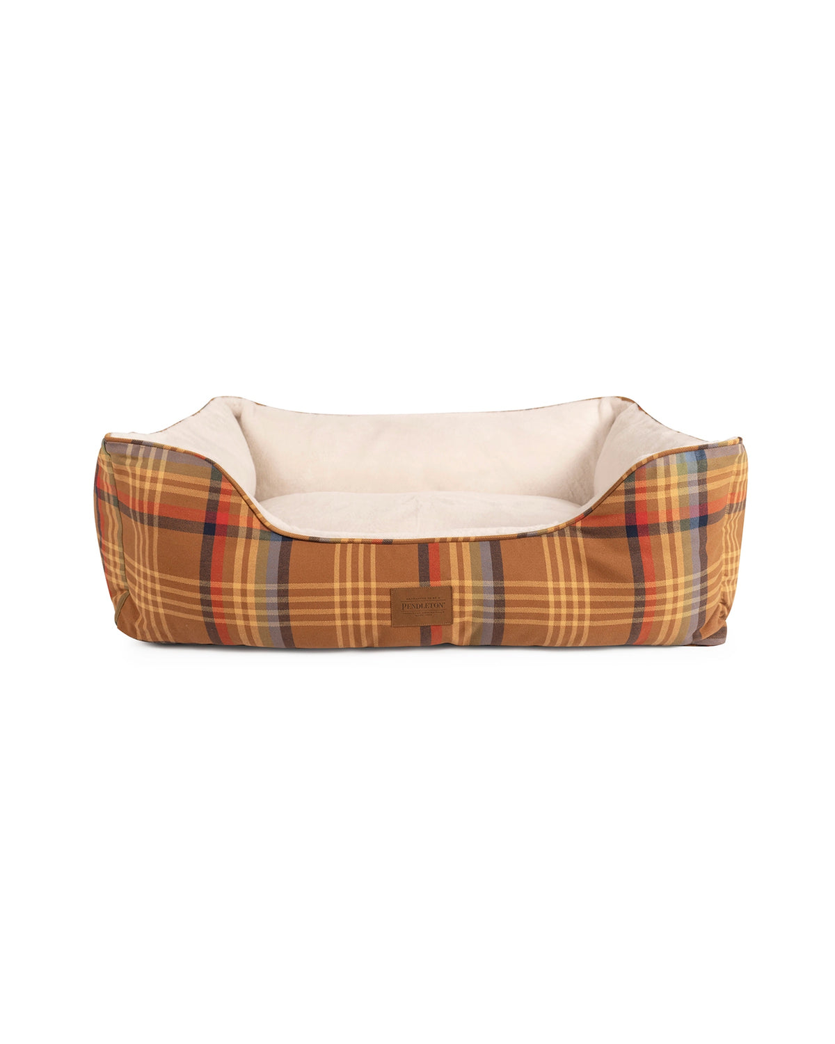 Tan plaid Pendleton Kuddler bolster dog bed with a cream faux fur sleep surface.