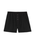 The Pop Boxer by Donni: men's lightweight black boxers made in Los Angeles with an elastic waistband and buttoned fly, shown on a plain white background.