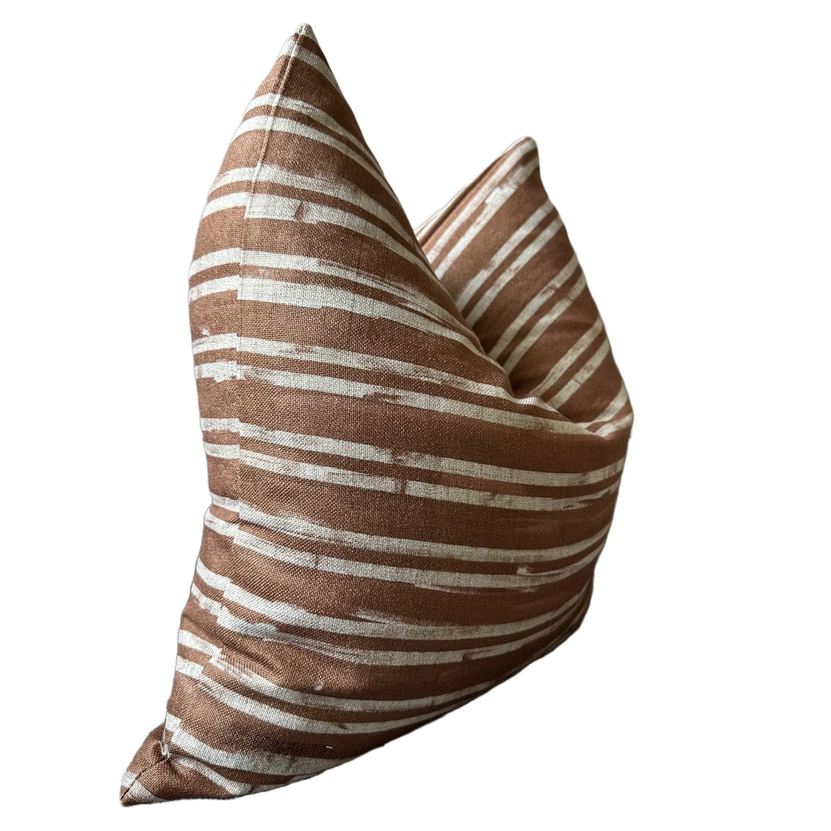 Brown woven pillow with white stripes, side view; Bungalow Furniture & Accessories Faire Radcliff Pillow 22x22.