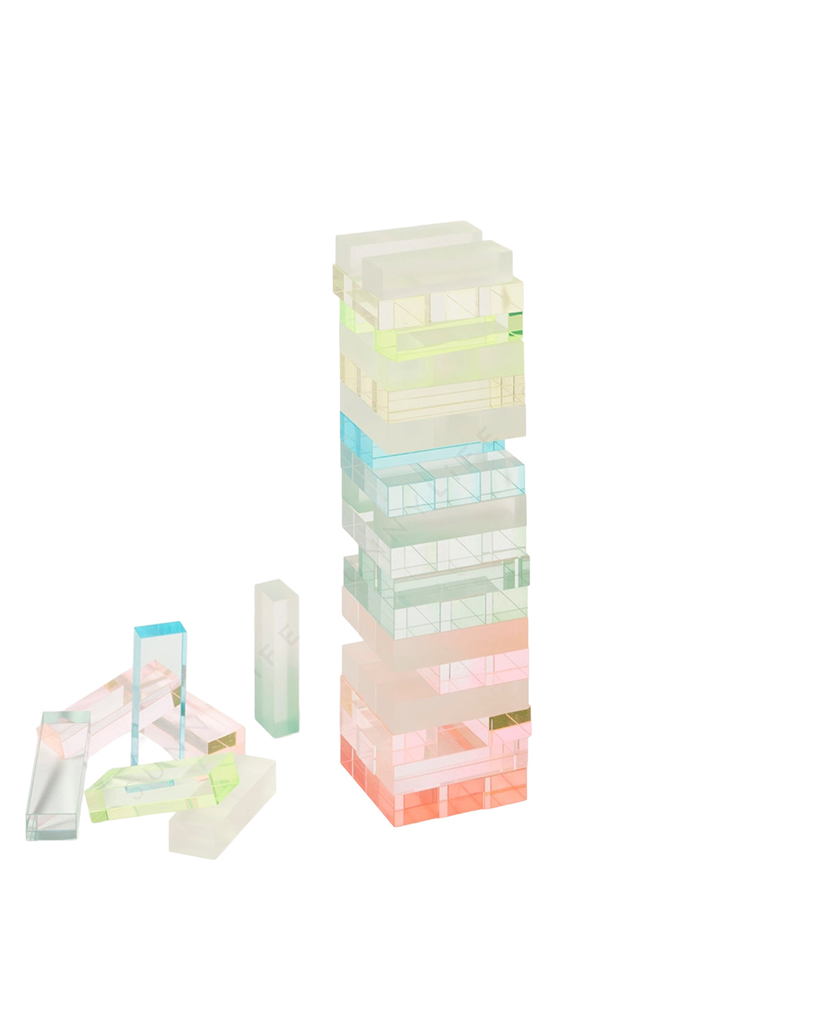 The Faire Ombre Lucite Sherbert Jumbling Tower Stacking Game features a pastel, translucent tower with removed blocks scattered to the left, showcasing its retro Lucite style against a white background.