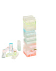 The Faire Ombre Lucite Sherbert Jumbling Tower Stacking Game features a pastel, translucent tower with removed blocks scattered to the left, showcasing its retro Lucite style against a white background.