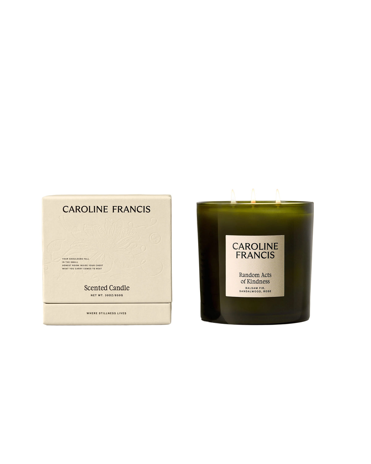 Caroline Francis Random Acts of Kindness 30oz candle in a dark green glass jar with its cream cardboard box.