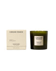 Caroline Francis Random Acts of Kindness 30oz candle in a dark green glass jar with its cream cardboard box.