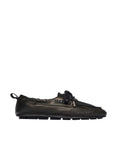 The Freda Salvador RIA Driver Loafer, shown in profile against a white background, is a black Nappa leather moccasin-style shoe with a flat rubber sole, decorative upper lacing, and a small heel pull tab.