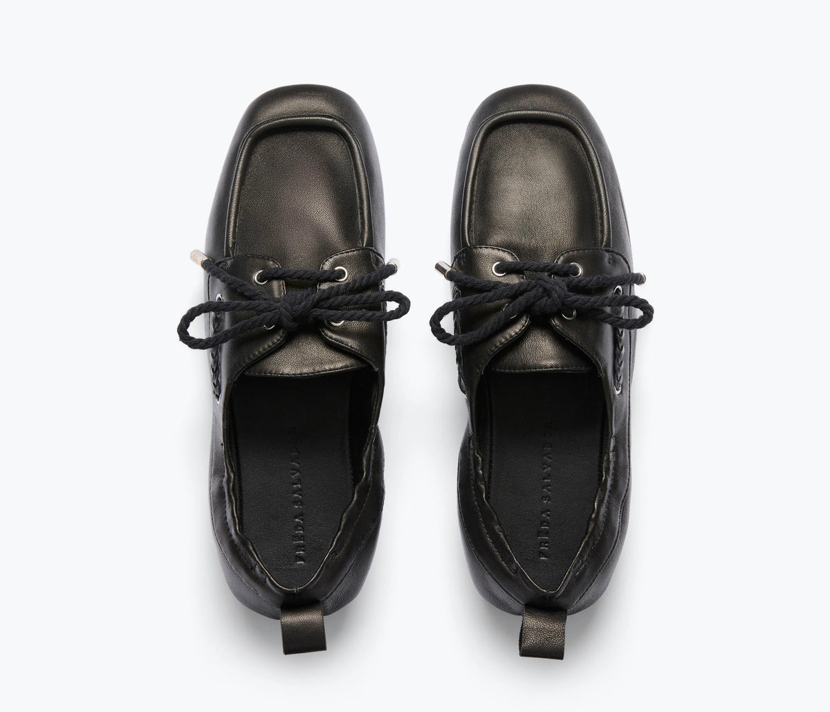 The Freda Salvador RIA Driver Loafer in black Nappa leather features square toes and black laces, shown from above against a light background.