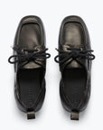 The Freda Salvador RIA Driver Loafer in black Nappa leather features square toes and black laces, shown from above against a light background.
