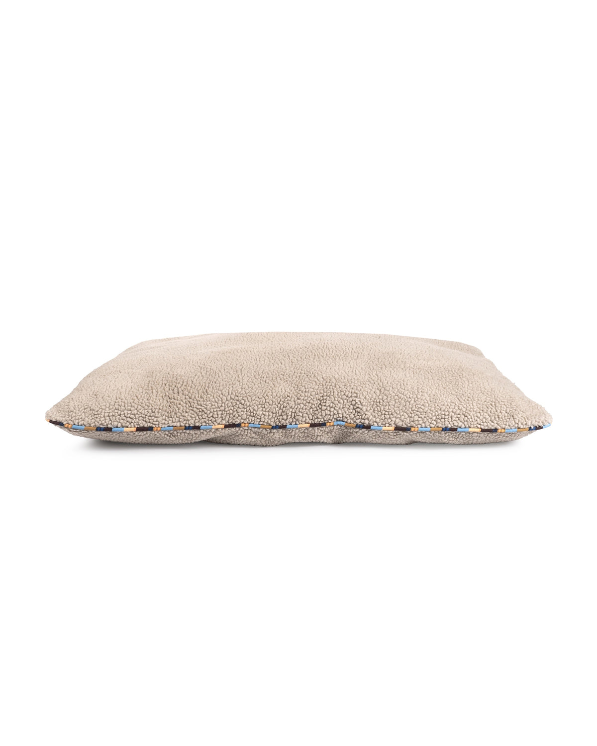 Bungalow Furniture & Accessories stone Sherpa Pillow Dog Bed, rectangular beige memory foam bed with blue/tan trim.