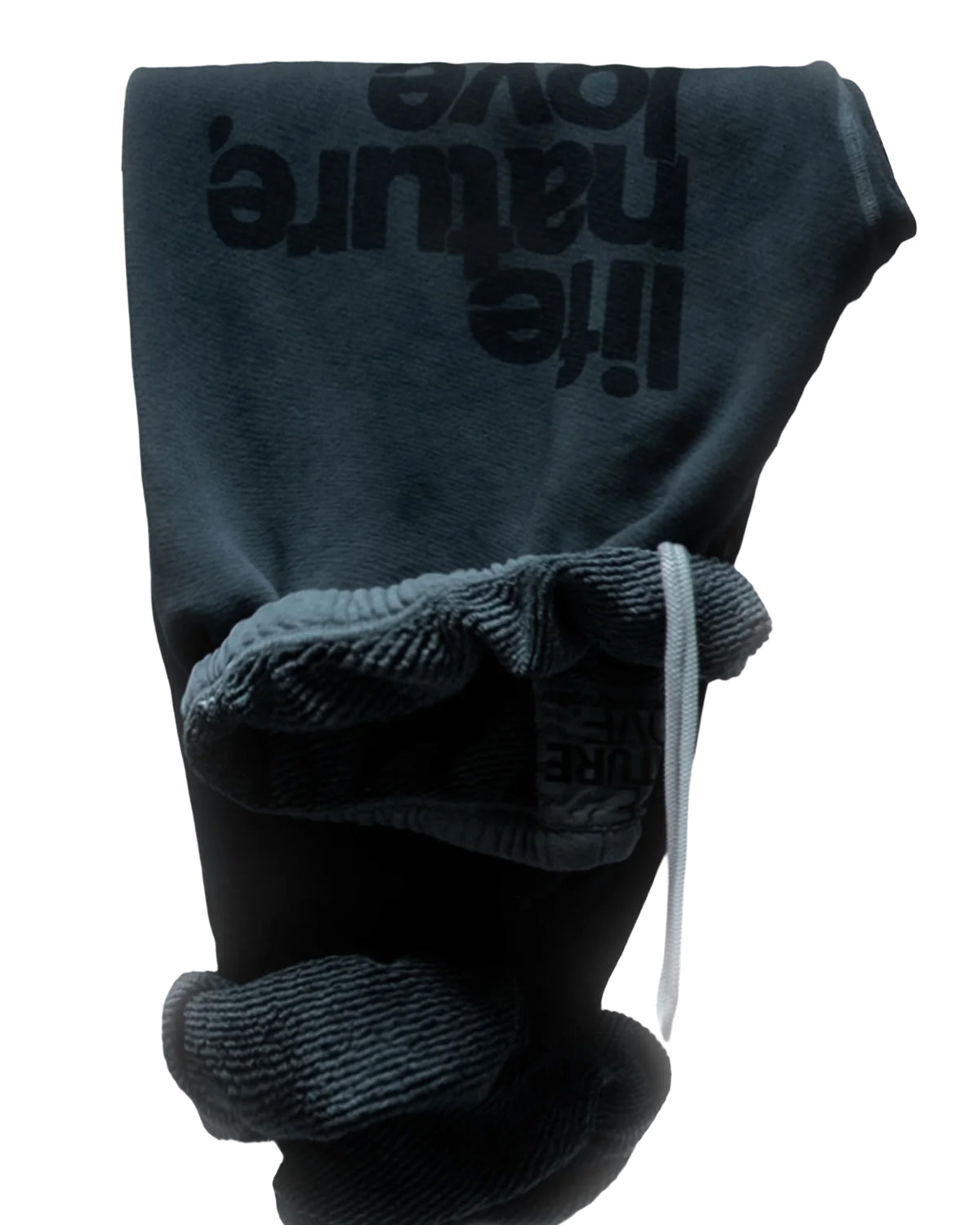 Folded Free City SuperYumm OG sweatpant in SpaceRocks Powder with partially visible life nature love text.