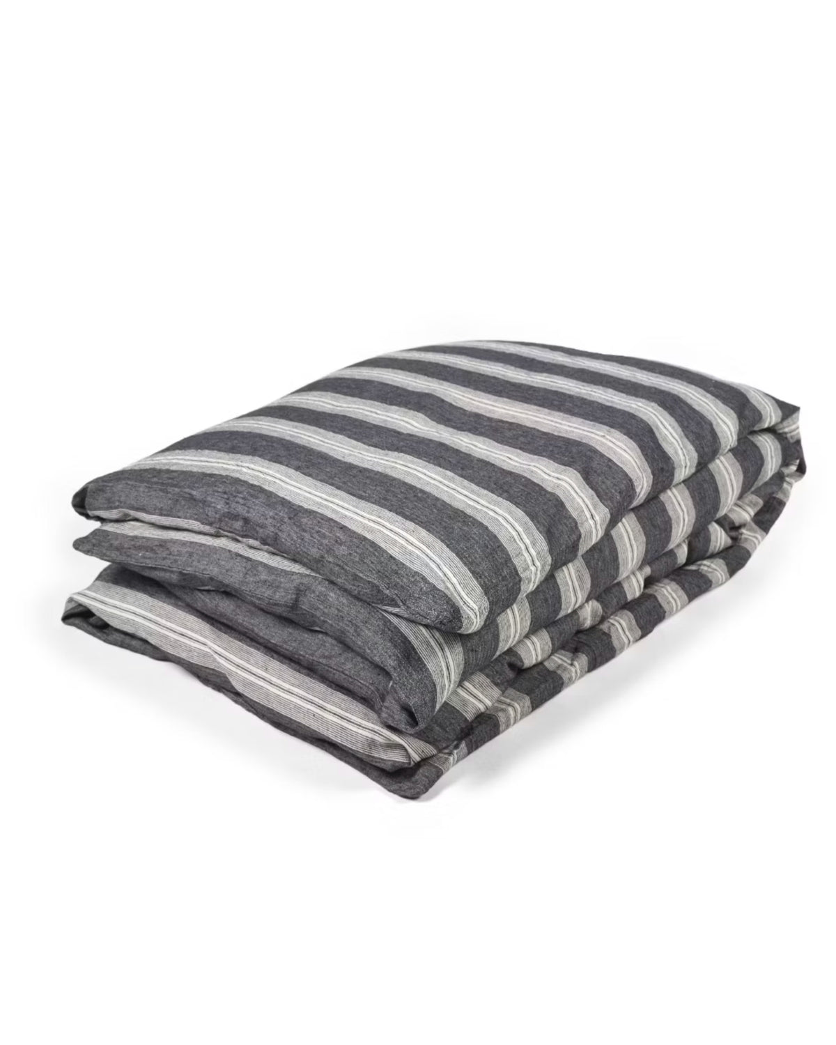 The Libeco Home Tahoe Duvet Cover, featuring classic dark and light gray horizontal stripes in the signature Tahoe Stripe style, is neatly folded on a white background.