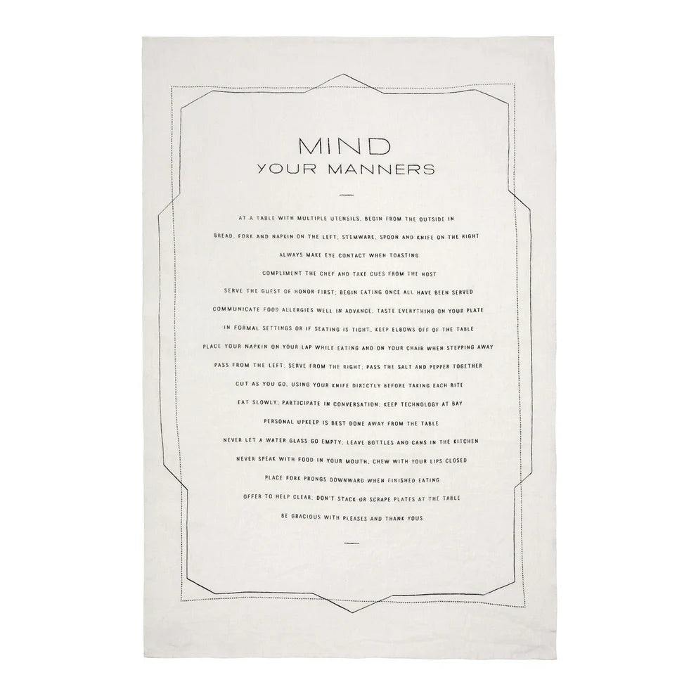 The Sir/Madam Tea Towels in black oyster white (18 x 28”) feature a thin black border, "MIND YOUR MANNERS" heading, and a list of etiquette rules elegantly printed in black at the center.