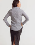 Striped Icon Shirt by THE SHIRT with no-gape buttons, styled with a black skirt, modern and polished look.