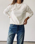 Hey Gang The Sweatshirt in Natural with blue jeans, casual style against a white background.