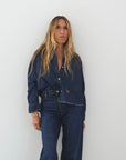 Kerri Rosenthal Tia Love Reigns shirt with heart elbow patches and matching wide-leg jeans.