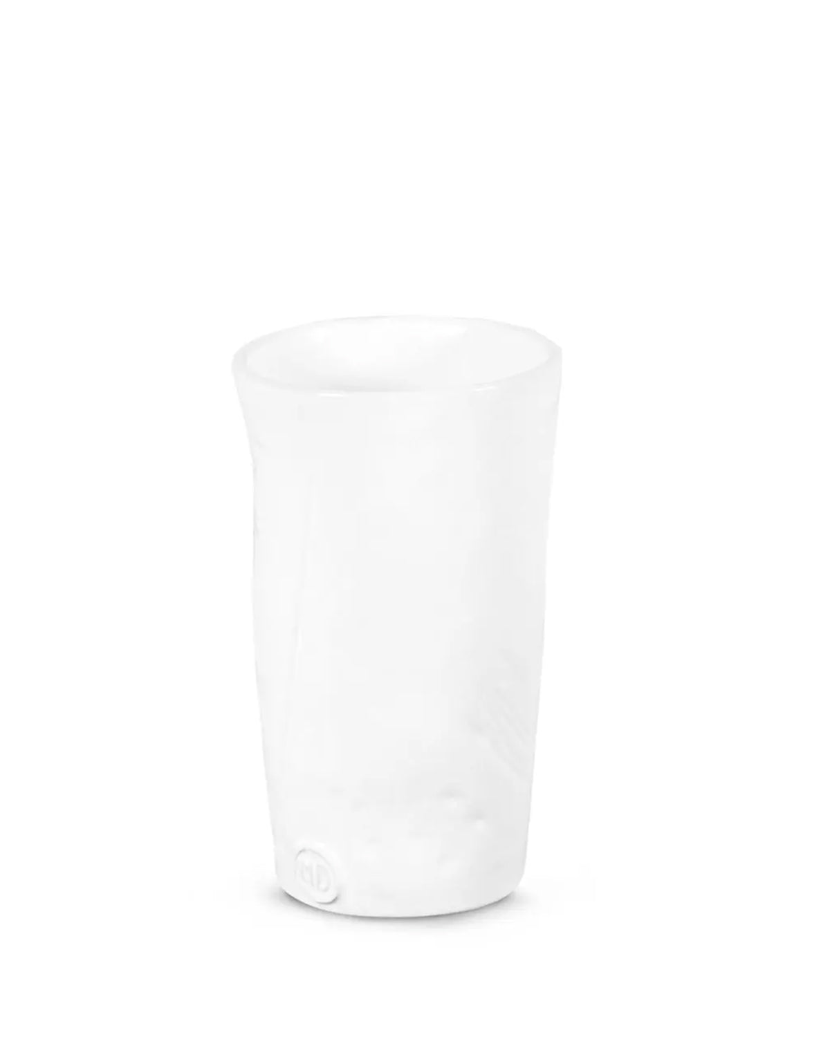 The Montes Doggett 5303 Tumbler No. 303 is a white ceramic cup with a handcrafted, slightly uneven shape and smooth surface, featuring a small circular mark near the base. Microwave and dishwasher safe. Plain white background.