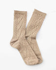 The Faire Twist Cotton Crew Socks in light brown feature a cable knit textured pattern and are laid side by side on a white background—perfect women’s socks for cozy, stylish comfort.
